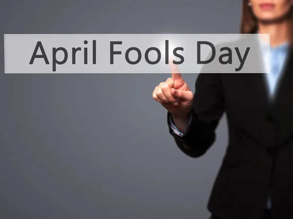 April Fools dnia - na białym tle ręka dotyka lub wskazując na b — Zdjęcie stockowe