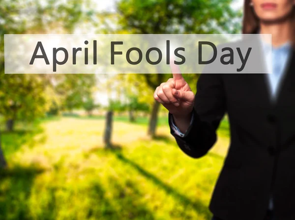 April Fools Day - Isolated female hand touching or pointing to b — Stock Photo, Image