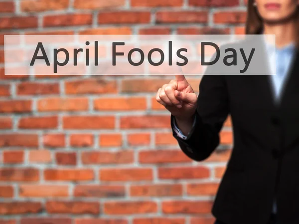 April Fools dnia - na białym tle ręka dotyka lub wskazując na b — Zdjęcie stockowe