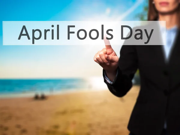April Fools Day - geïsoleerde vrouwelijke hand aanraken of wijst naar b — Stockfoto