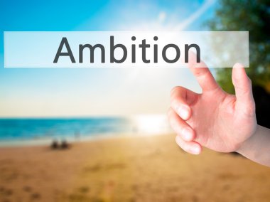 Hırs - arka plan bulanık kavramı üzerinde bir düğmeye basarak el 