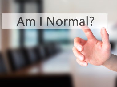 Normal miyim? -Arka plan bulanık con üzerinde bir düğmeye basarak hand