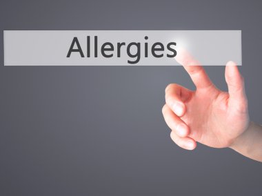 Alerji - arka plan bulanık kavramı üzerinde bir düğmeye basarak el