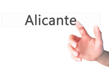 Alicante - arka plan bulanık kavramı üzerinde bir düğmeye basarak el 