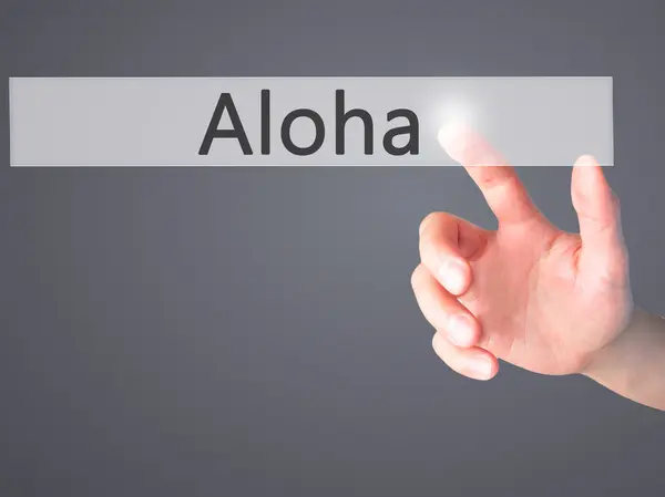 Aloha - Knopfdruck von Hand auf verschwommenes Hintergrundkonzept — Stockfoto