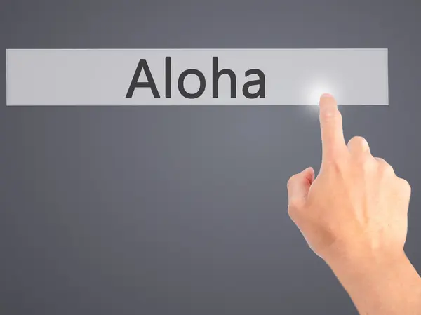 Aloha - Appuyer à la main sur un bouton sur le concept de fond flou sur — Photo