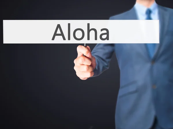 Aloha - Geschäftsmann hält Schild in der Hand — Stockfoto