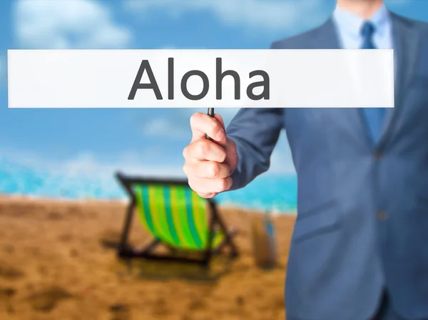 Aloha - Empresario mano sosteniendo cartel — Foto de Stock