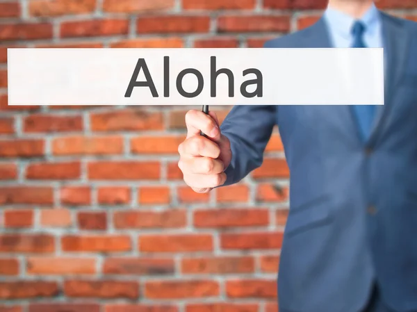 Aloha - Geschäftsmann hält Schild in der Hand — Stockfoto