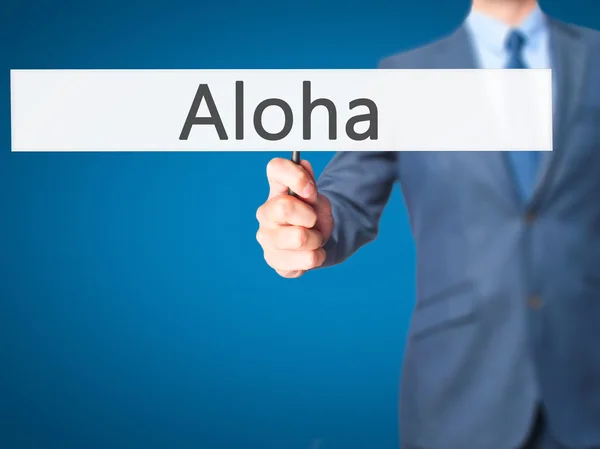 Aloha - Geschäftsmann hält Schild in der Hand — Stockfoto