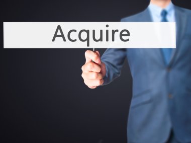 Acquire - Business man showing sign clipart