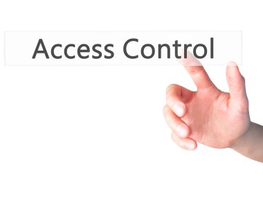 Access Control - Hand pressing a button on blurred background co clipart