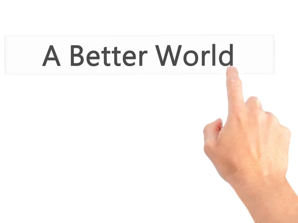 A Better World - Hand pressing a button on blurred background co — Stock Photo, Image