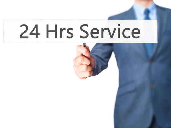 24 Hrs Service - Business man showing sign — Stock Photo, Image