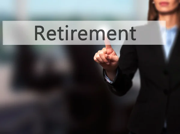 Retirement - Businesswoman hand pressing button on touch screen — Stock Photo, Image