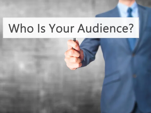 Who Is Your Audience? - Businessman hand holding sign — Stock Photo, Image