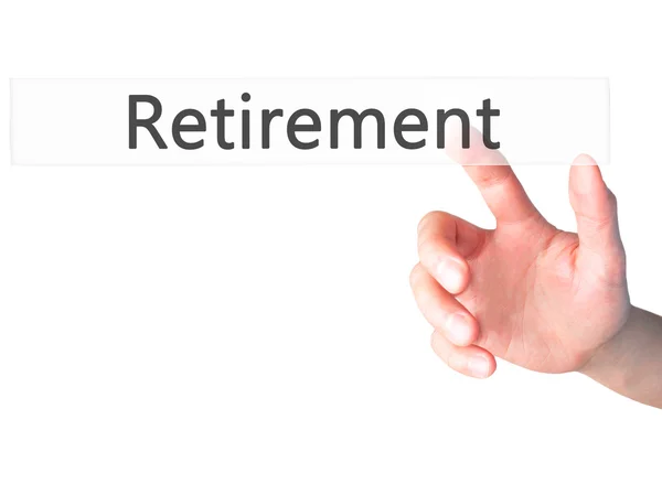 Выход на пенсию - ручное нажатие кнопки на размытом фоне концепции — стоковое фото