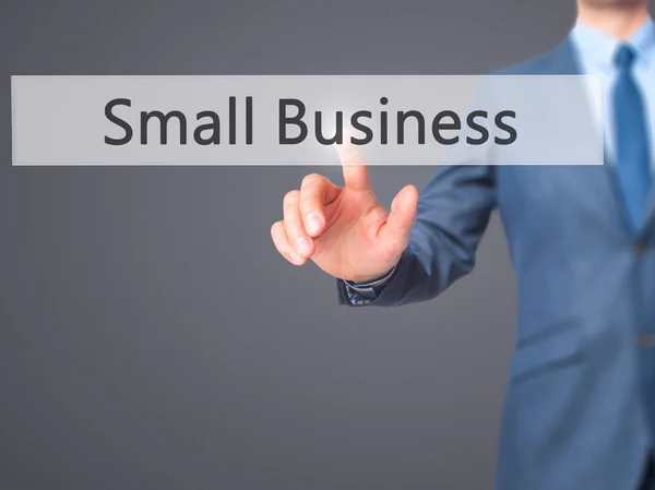 Pequena empresa - Empresário mão pressionando botão na tela de toque — Fotografia de Stock
