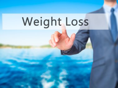 Kilo kaybı - işadamı tıklatın sanal dokunmatik ekran.