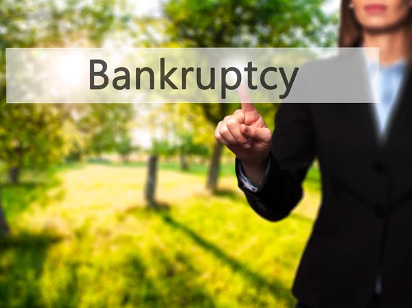 Bankruptcy - Isolated female hand touching or pointing to button — Stock Photo, Image