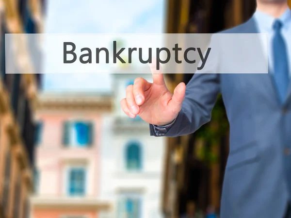 Bankruptcy -  Businessman press on digital screen. — Stock Photo, Image