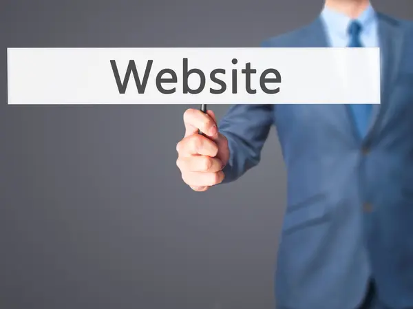 Website - Business man showing sign — Stock Photo, Image