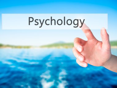 Psikoloji - arka plan bulanık concep üzerinde bir düğmeye basarak el