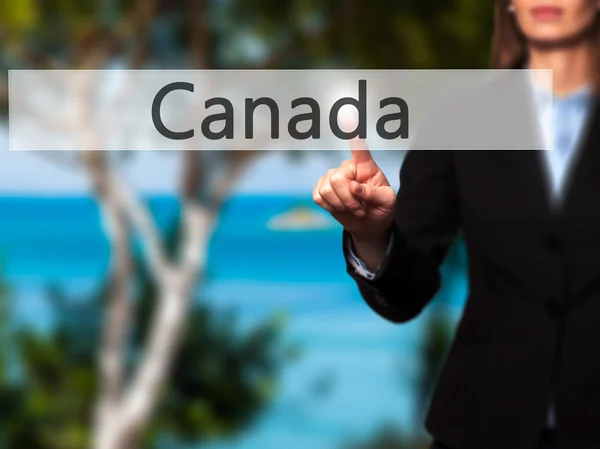 Canadá - Mano femenina aislada tocando o señalando el botón — Foto de Stock