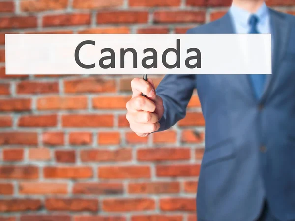 Canada - Uomo d'affari che mostra segno — Foto Stock