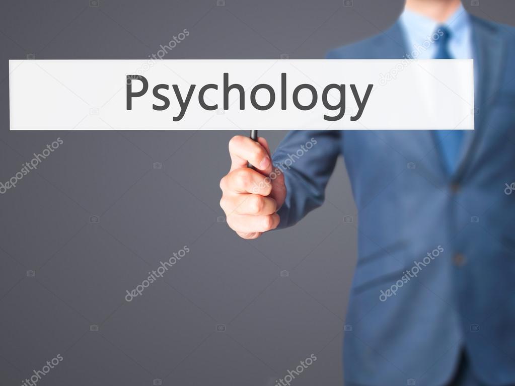 Psychology - Business man showing sign