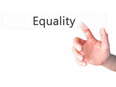 Eşitlik - Bulanık arka plan konseptinde düğmeye basarak el 