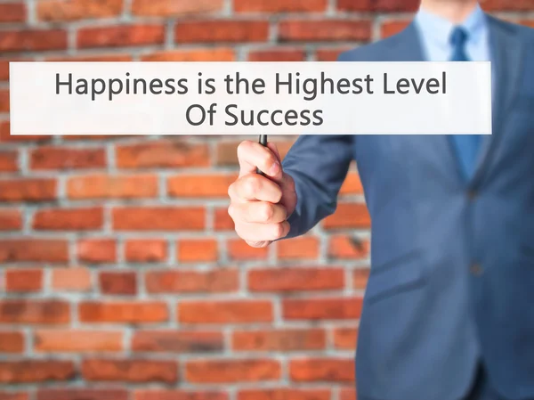 Štěstí je nejvyšší úroveň úspěchu-ruční Hohol obchodník — Stock fotografie