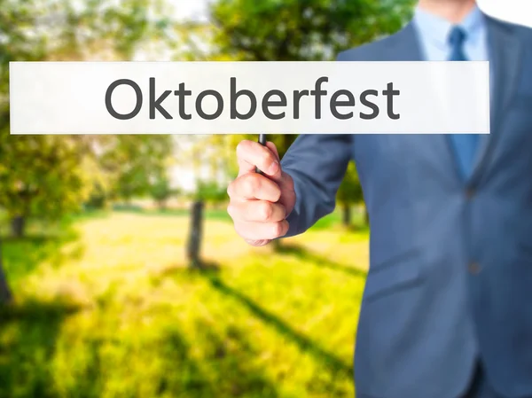 Oktoberfest - Forretningsmand hånd holder tegn - Stock-foto