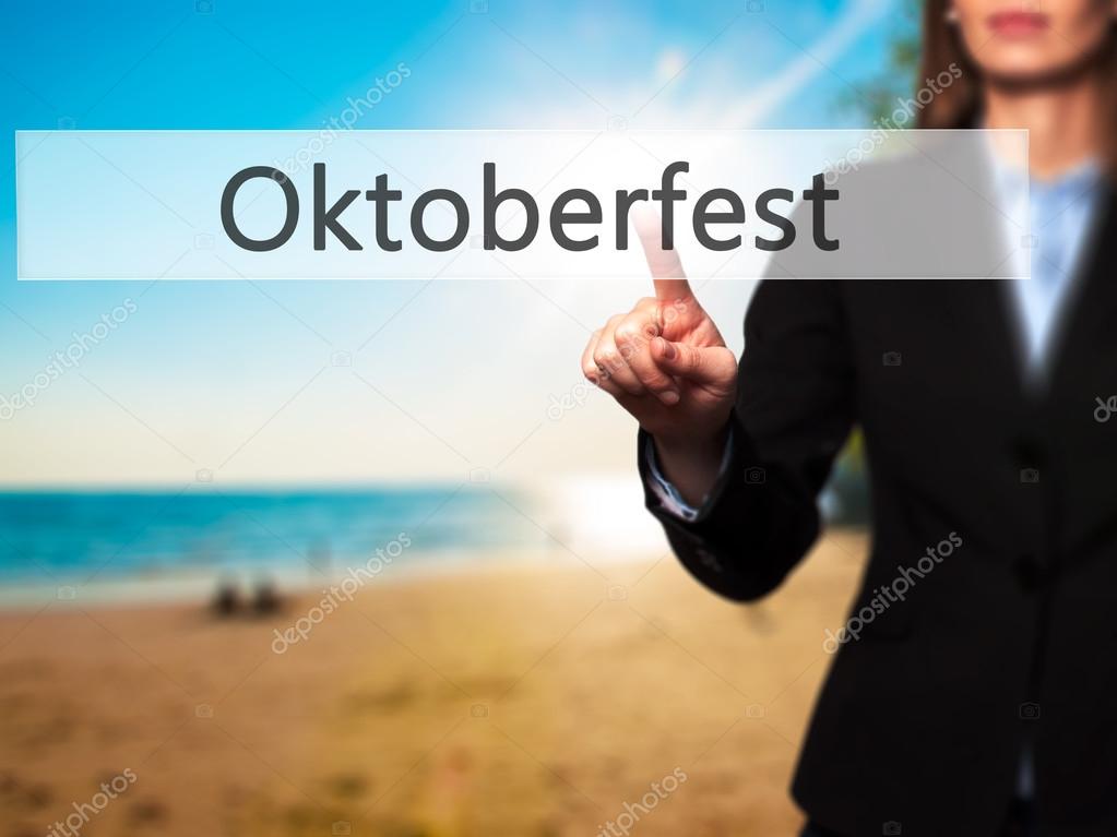 Oktoberfest - Businesswoman pressing modern  buttons on a virtua