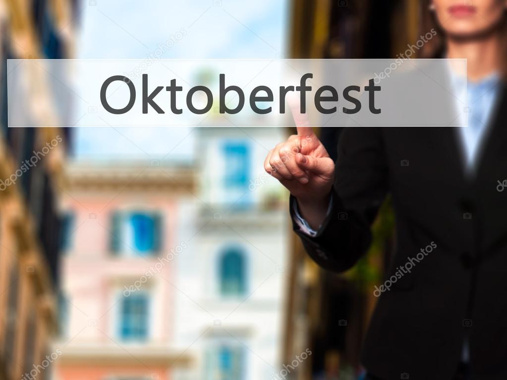 Oktoberfest - Businesswoman pressing modern  buttons on a virtua