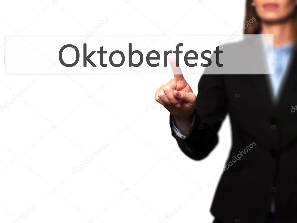 Oktoberfest - Businesswoman pressing modern  buttons on a virtua