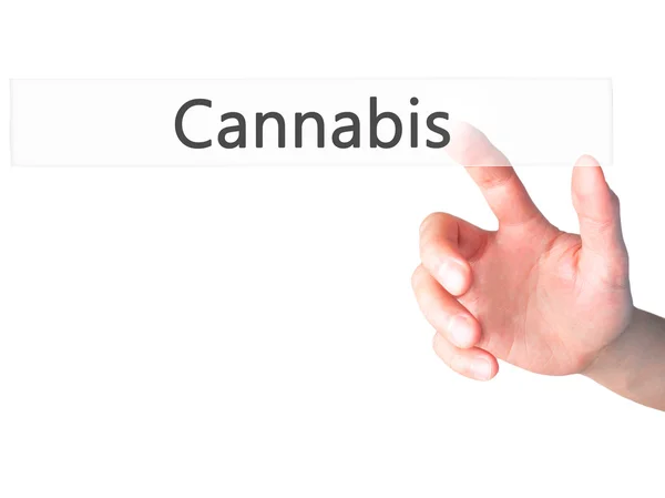 Cannabis-hand trycka på en knapp på suddig bakgrund koncept — Stockfoto