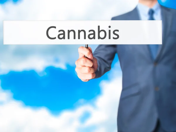 Cannabis - Businessman hand holding sign — Stock Photo, Image