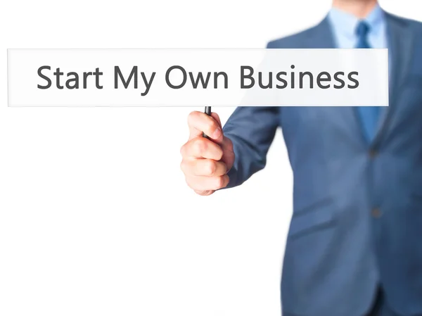 Iniciar mi propio negocio - Empresario mano sosteniendo el cartel — Foto de Stock