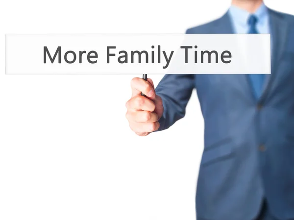 More Family Time - Businessman hand holding sign — Stock Photo, Image