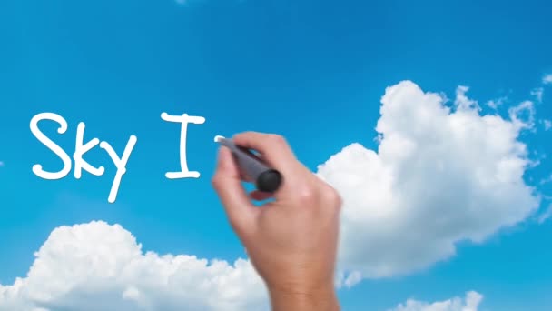 The sky is the limit. Inspirational phrase. Man Hand writing. Amazing Time Lapse. Blue Sky and clouds passing by. Words red Circled. — Stock Video