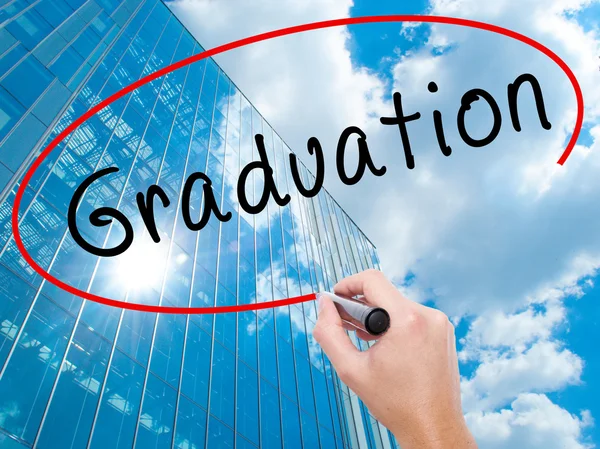 Man Hand writing Graduation with black marker on visual screen — Stock Photo, Image