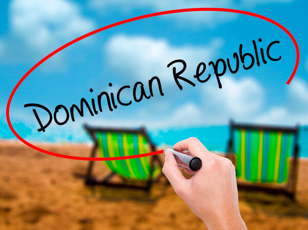 Man Hand writing Dominican Republic with black marker on visual 