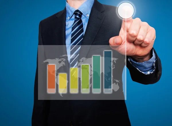 Businessman in dark suit pushing button worldmap global Growth. Green graph on world map. — Stock Photo, Image