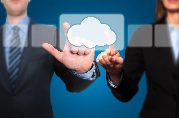 Businessman and Businesswoman pressing  pressing cloud icon — Stock Photo, Image
