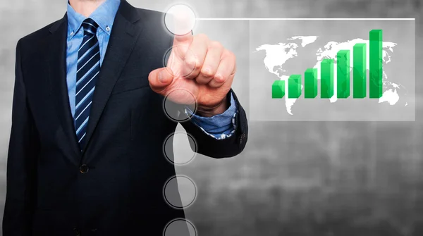 Businessman in dark suit pushing button worldmap global Growth. Green graph on world map. — Stock Photo, Image