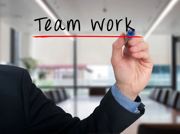 Team werk concept zakenman hand schrijven teamwerk - Stock beeld — Stockfoto