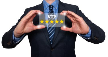 İşadamı VIP beş yıldız onun el - stok görüntü içinde tutar.
