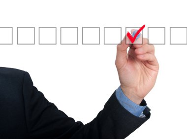 Businessman ticks off in in a square. Task list concept. Isolated on grey background.