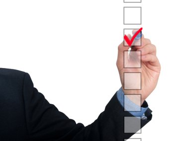 Businessman ticks off in in a square. Task list concept. Isolated on grey background.